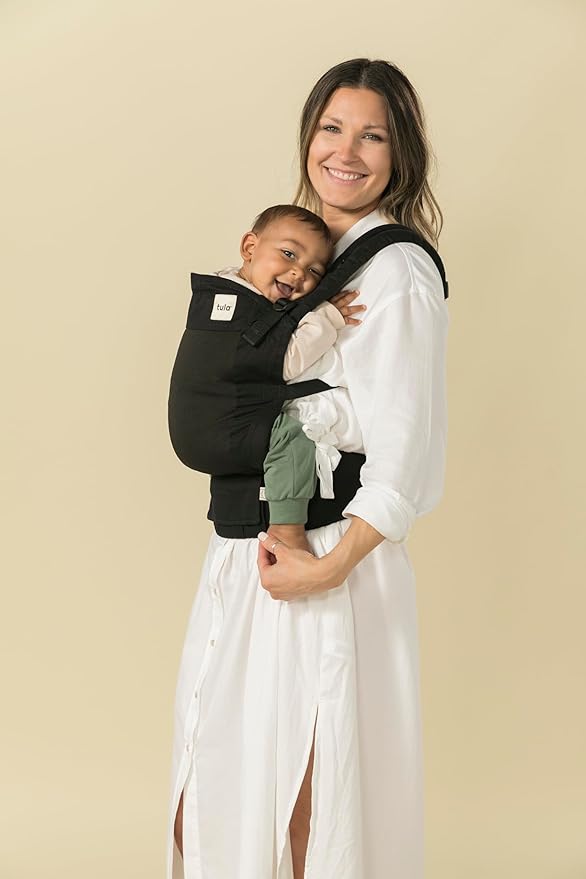 Baby Tula Lite Compact Baby Carrier, Ultra Compact and Lightweight, Convenient Carry Pouch, Ergonomic and Multiple Positions for 12 – 30 pounds - Black