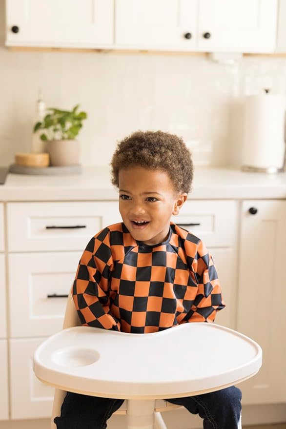 Tiny Twinkle Long Sleeve Bib for Babies & Toddlers – Waterproof Smock Bib for Eating – Machine Washable & Mess-Proof, Baby Feeding Essential & Shower Must-Have(Orange,Black Checkers, 6–24M)