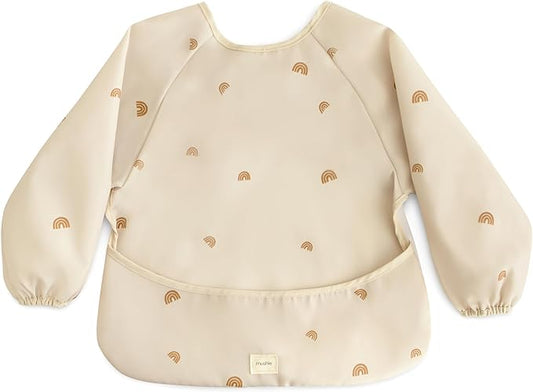 mushie Long Sleeve Baby Bib | Water Resistant Adjustable Fit for Ages 6-24 Months