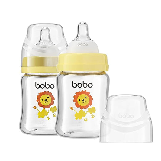 YOHKOH Glass Baby Bottles with Slow Flow Nipple, Newborn Anti-Colic Baby Bottles for 0+ Months, Wide Neck Feeding Bottle, Clear (Yellow, 5oz (Pack of 2))