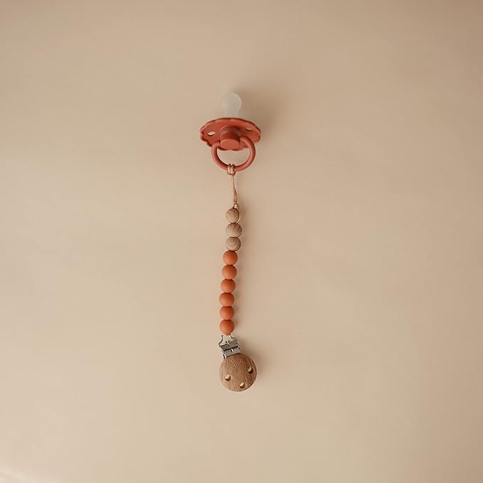 mushie 100% Silicone Baby Pacifier Clip BPA Free | Eva (Clementine)