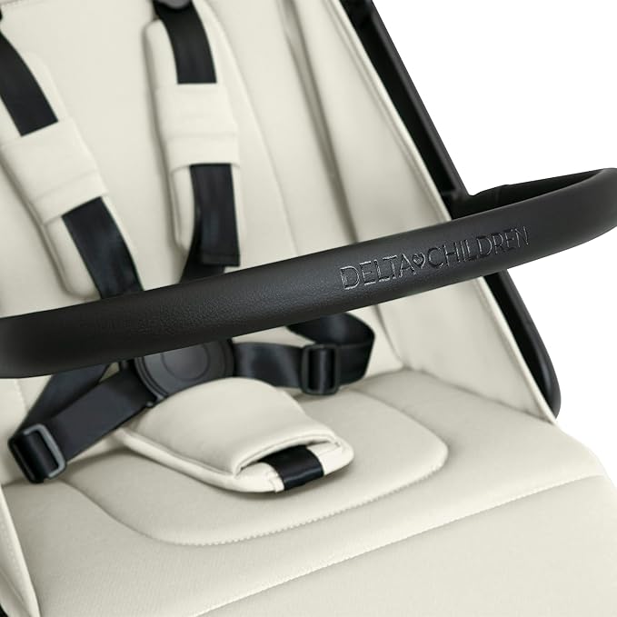 Delta Children Icon Ultra Compact Lightweight Everyday & Travel Stroller - One-Hand Fold - Only 15.6 Pounds - Fits in Overhead Compartments - Greenguard Gold Certified - Multi-Position Recline, Cream