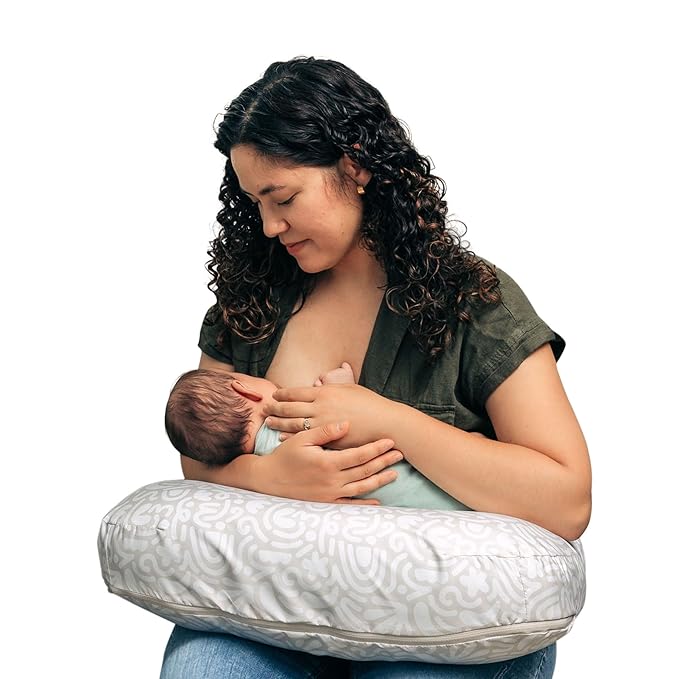 Boppy Nursing Pillow - Ergonomic Bottle & Breastfeeding Pillow with High, Firm, Large Area, Water-Repellent Cushion with Washable Cover; Baby Safety Alliance Verified - Cream Retro Squiggles