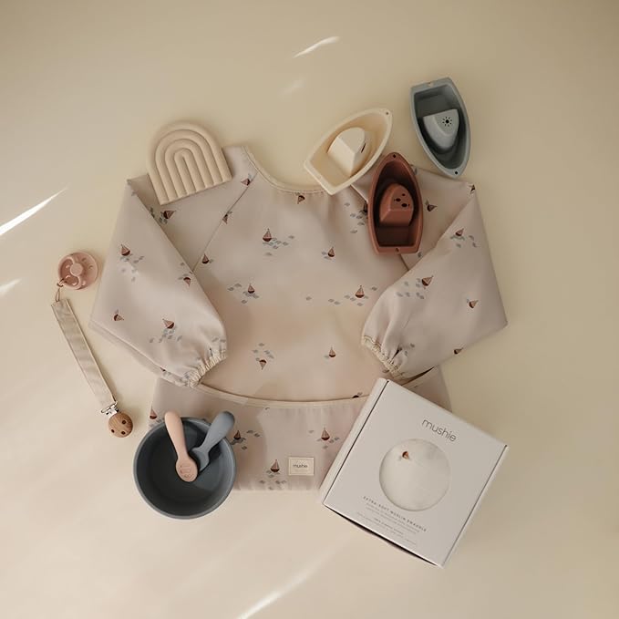 mushie Long Sleeve Baby Bib | Water Resistant Adjustable Fit for Ages 6-24 Months