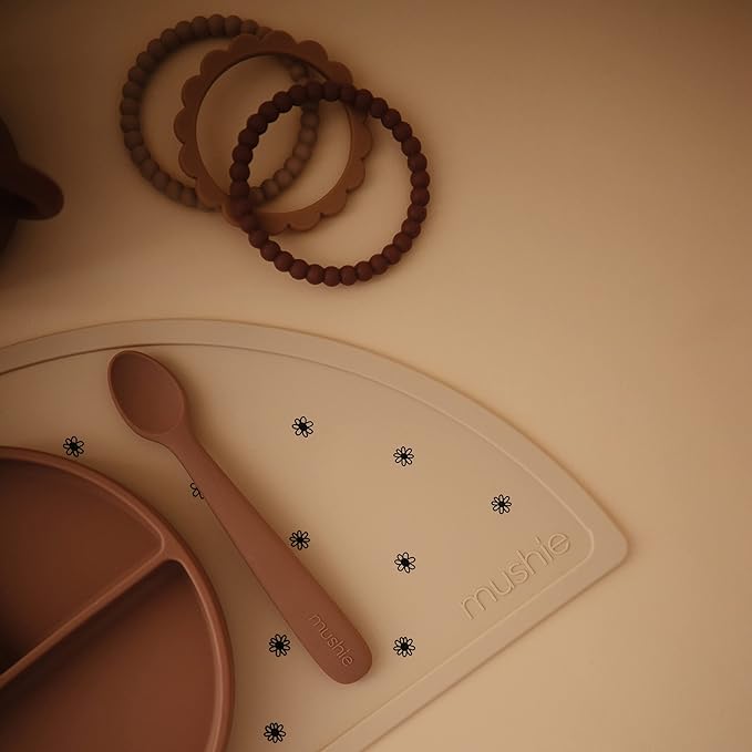 mushie Silicone Placemat for Kids | BPA-Free Non-Slip Design (Black Daisy)