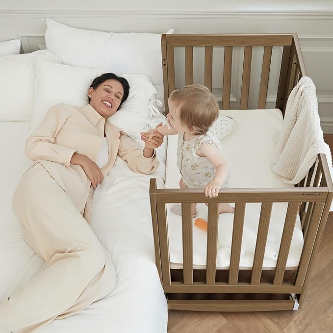 EvoNest Baby Crib, 6 in 1 Convertible Mini Crib with Wheels, 100% New Zealand Wood Growing Bed, 4 Adjustable Mattress Height，Walnut Brown (Walnut Brown)