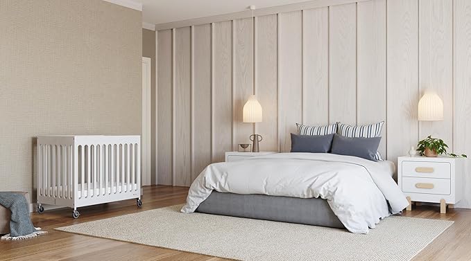Foundations Boutique Folding Mini Baby Crib - Compact, Portable, Wooden Hotel Crib, Foldable Compact Cribs for Baby & Toddlers - Includes 3" Foam Mattress - White