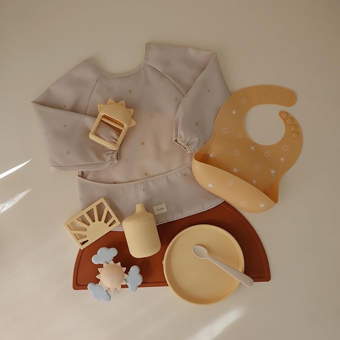 mushie Long Sleeve Baby Bib | Water Resistant Adjustable Fit for Ages 6-24 Months