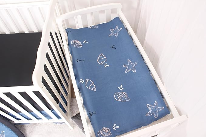 CaSaJa 4-Piece Crib Bedding Set for Boys and Girls, Nursery Baby Bedding Set Including Quilted Comforter with Fitted Crib Sheet and Changing Pad Covers, Reversible Quilt Design, Sea Conch