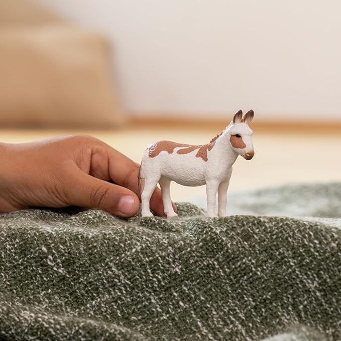 Schleich Farm World American Spotted Donkey Animal Figurine - Highly Detailed and Durable Farm Animal Toy, Fun and Educational Play for Boys and Girls, Gift for Kids Ages 3+, Multicolor, 2.5 inch