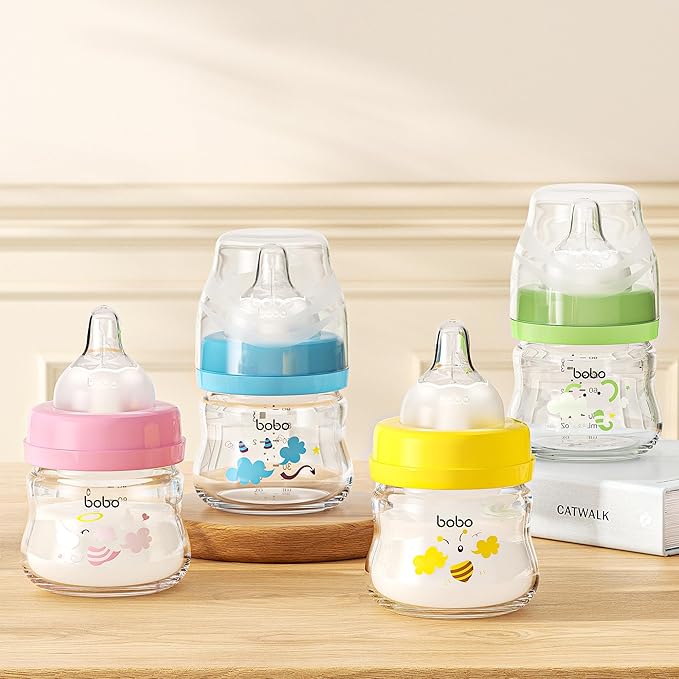 YOHKOH Glass Baby Bottles with Slow Flow Nipple, Newborn Anti-Colic Baby Bottles for 0+ Months, Wide Neck Feeding Bottle, Clear (Green, 2.7oz (Pack of 2))