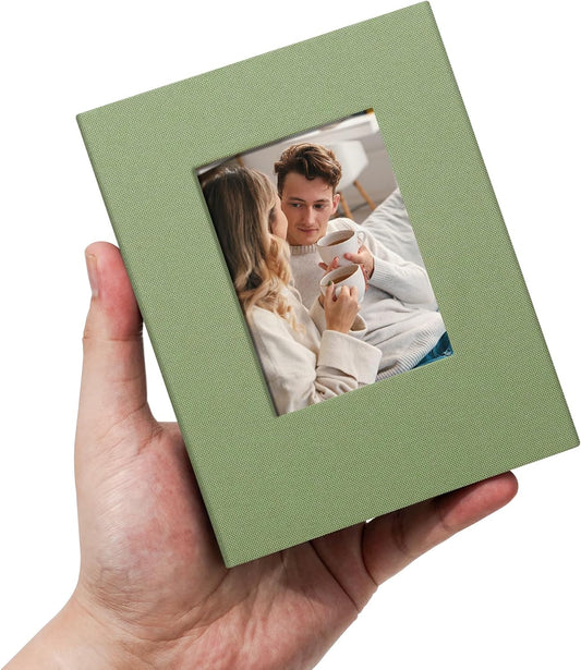 Small 4x6 Photo Album 100 Pockets Linen Cover with Front Window Portable Mini Picture Book for Family Travel Wedding and Memory Keepsake Organizer Light Green