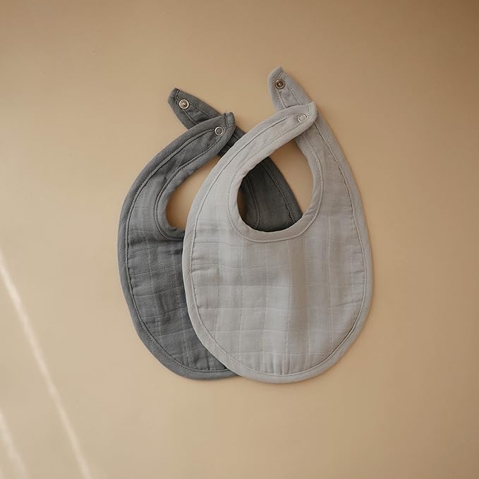 mushie Muslin Baby Bib | Soft Cotton for Infant Drips, Drools & Feedings | Adjustable Fit | 2 Pack