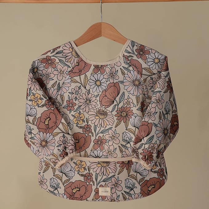 mushie Long Sleeve Baby Bib | Water Resistant Adjustable Fit for Ages 6-24 Months