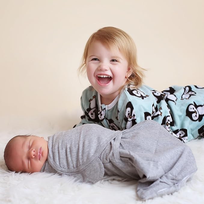SleepingBaby Zipadee-Zip Transition Swaddle - Cozy Fleece Wearable Blanket with Two-Way Zipper for Baby Sleep - Perfect Penguin, Large (12-24 Month)