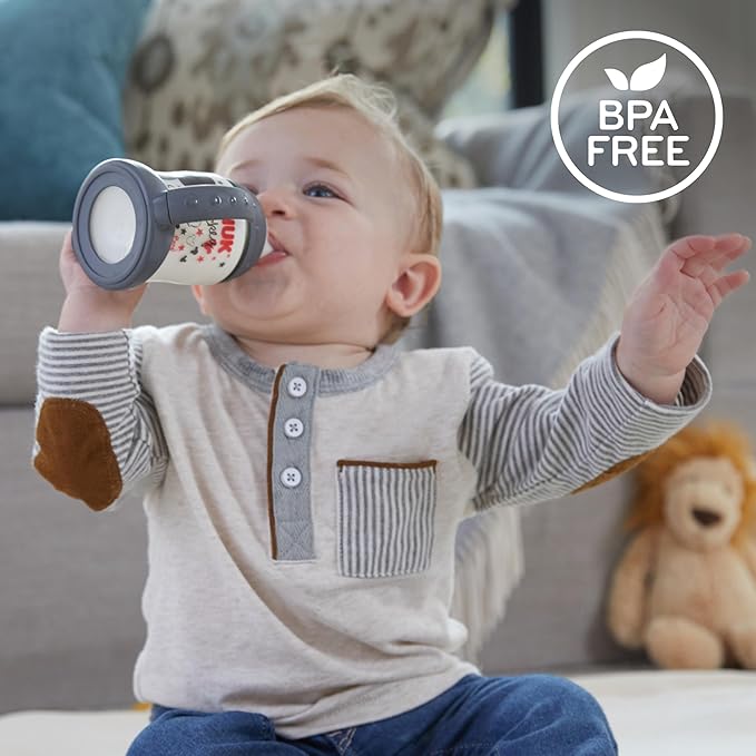 NUK Learner Cup, 5oz, Pack of 2, Sesame Street, Elmo and Cookie Monster – Soft Spout, Easy-Grip Handles, BPA Free, Spill Proof Transition Sippy Cup