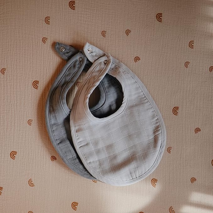 mushie Muslin Baby Bib | Soft Cotton for Infant Drips, Drools & Feedings | Adjustable Fit | 2 Pack