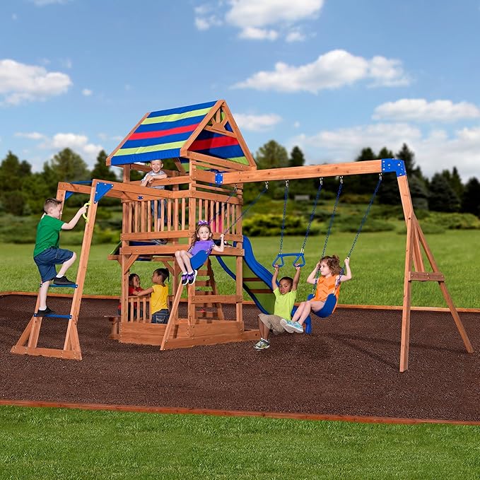 Backyard Discovery Beach Front Cedar Wood Swing Set with Wave Slide, Play Deck, Monkey Bars, Rock Wall Ladder, Shaded Picnic Area, Snack Bar, Belt Swings, Trapeze, Sandbox Area, Outdoor Playset